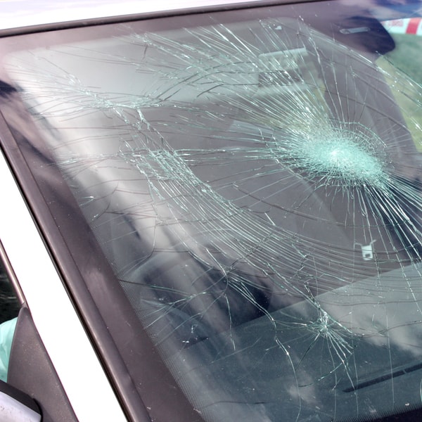 which auto glass replacement service to call and what does it cost to fix broken windshield  in Massachusetts